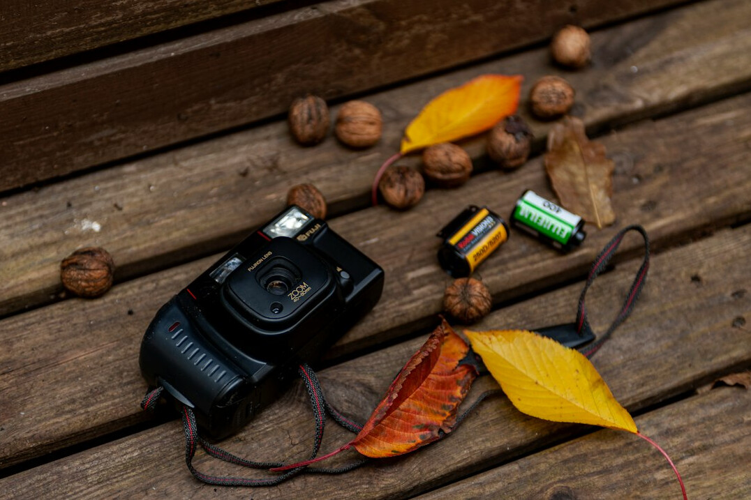 Vintage camera on a wooden surface