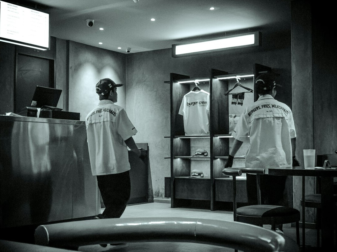 store detective watching security camera